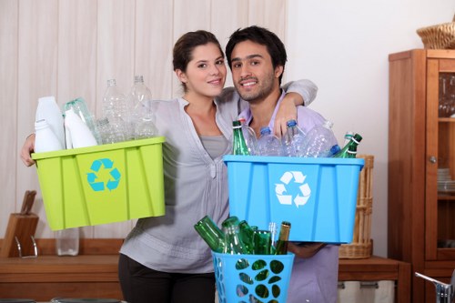 Workers wearing PPE during a waste handling operation